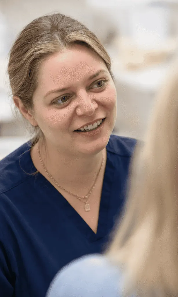 A Diamond Court team member talking with a patient