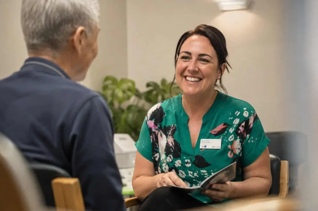 Tara talking through a plan with an older patient