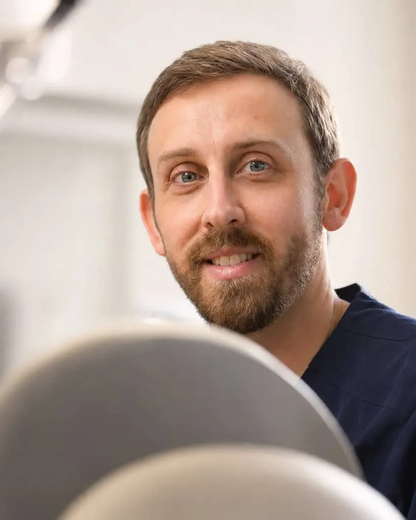 A dentist in the treatment room