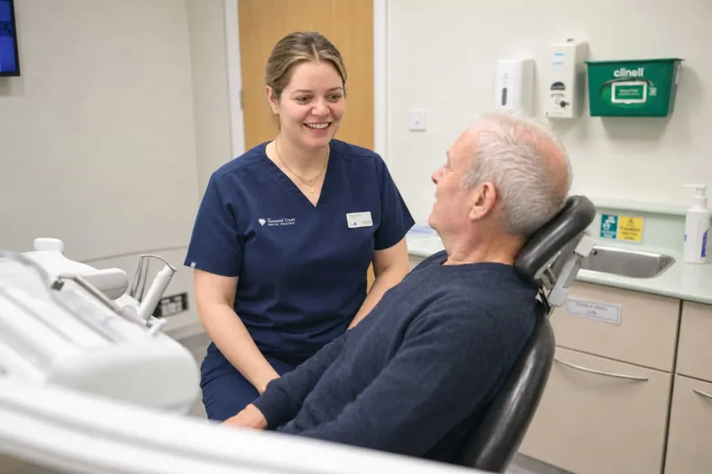 A dental nurse with a patient at Diamond Court