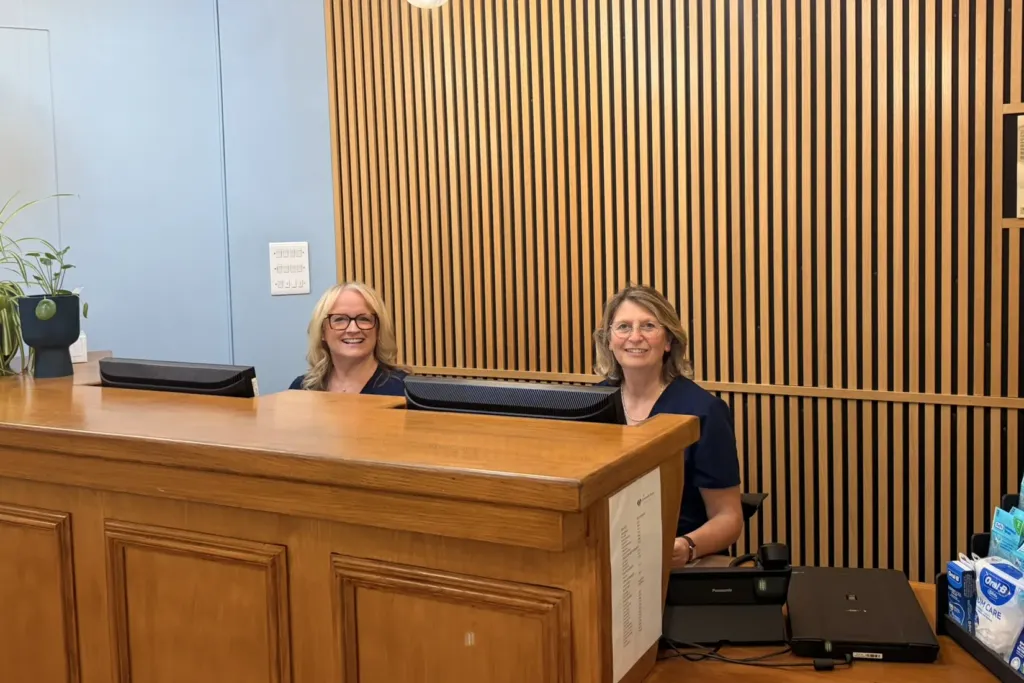 Two of our receptionists at the front desk
